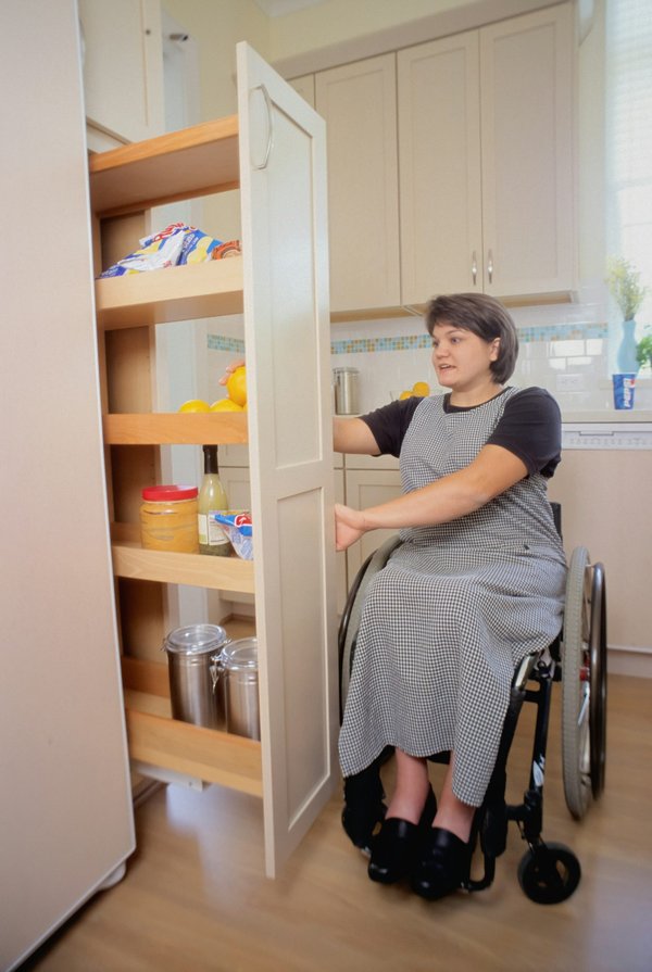 What are the key safety features to include in a kitchen design for a visually impaired person?